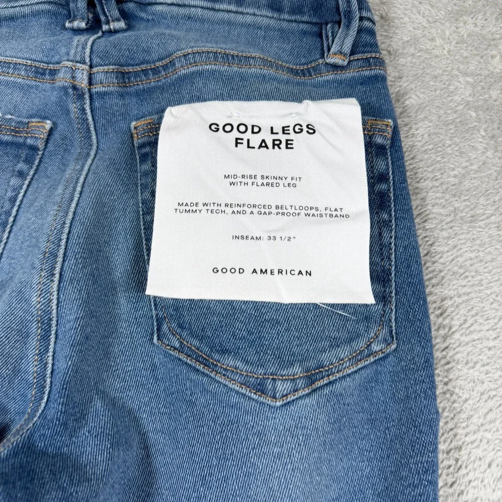 Good American Good Legs Flare Jeans Women 0/25 Blue Mid Rise Distressed NWT